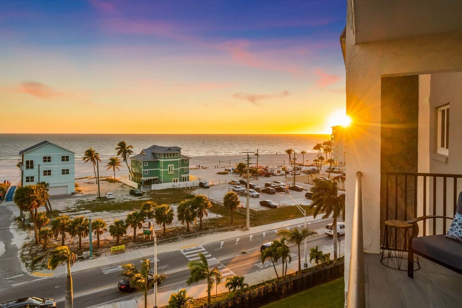 Private balcony on 6th floor at Batiki West 609 with panoramic Gulf of Mexico sunset views